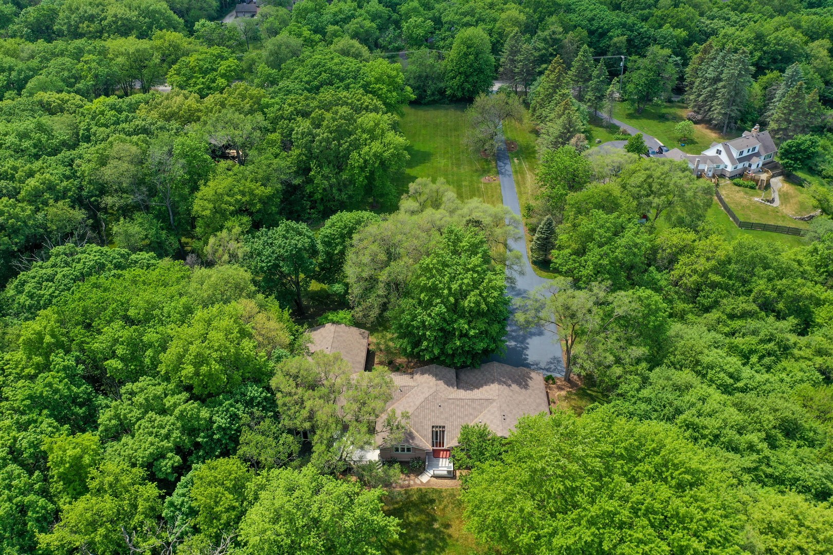 7704 Newbold Road Cary, IL 60013 - Photo 6 of 56 an aerial view of residential house with outdoor space and trees all around