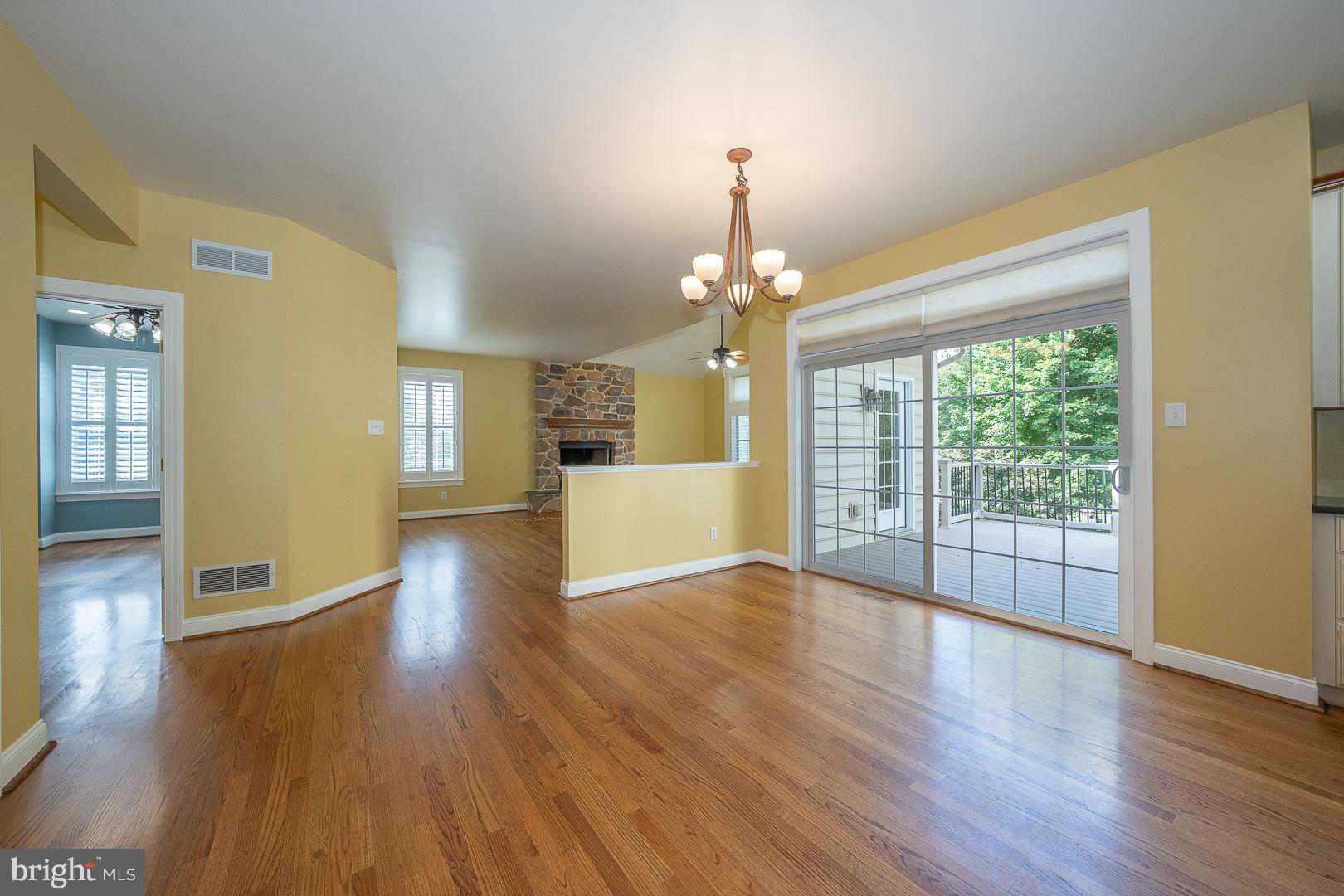 2140 Howell Road Malvern, PA 19355 - Photo 16 of 47 a view of an empty room with wooden floor and a window