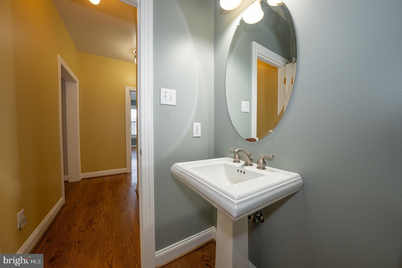 2140 Howell Road Malvern, PA 19355 - Photo 22 of 47 a bathroom with a sink and a mirror