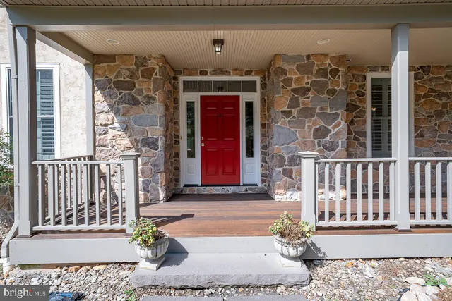 a front view of a house with a porch