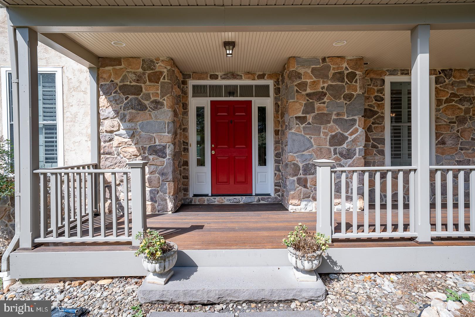 2140 Howell Road Malvern, PA 19355 - Photo 3 of 47 a front view of a house with a porch