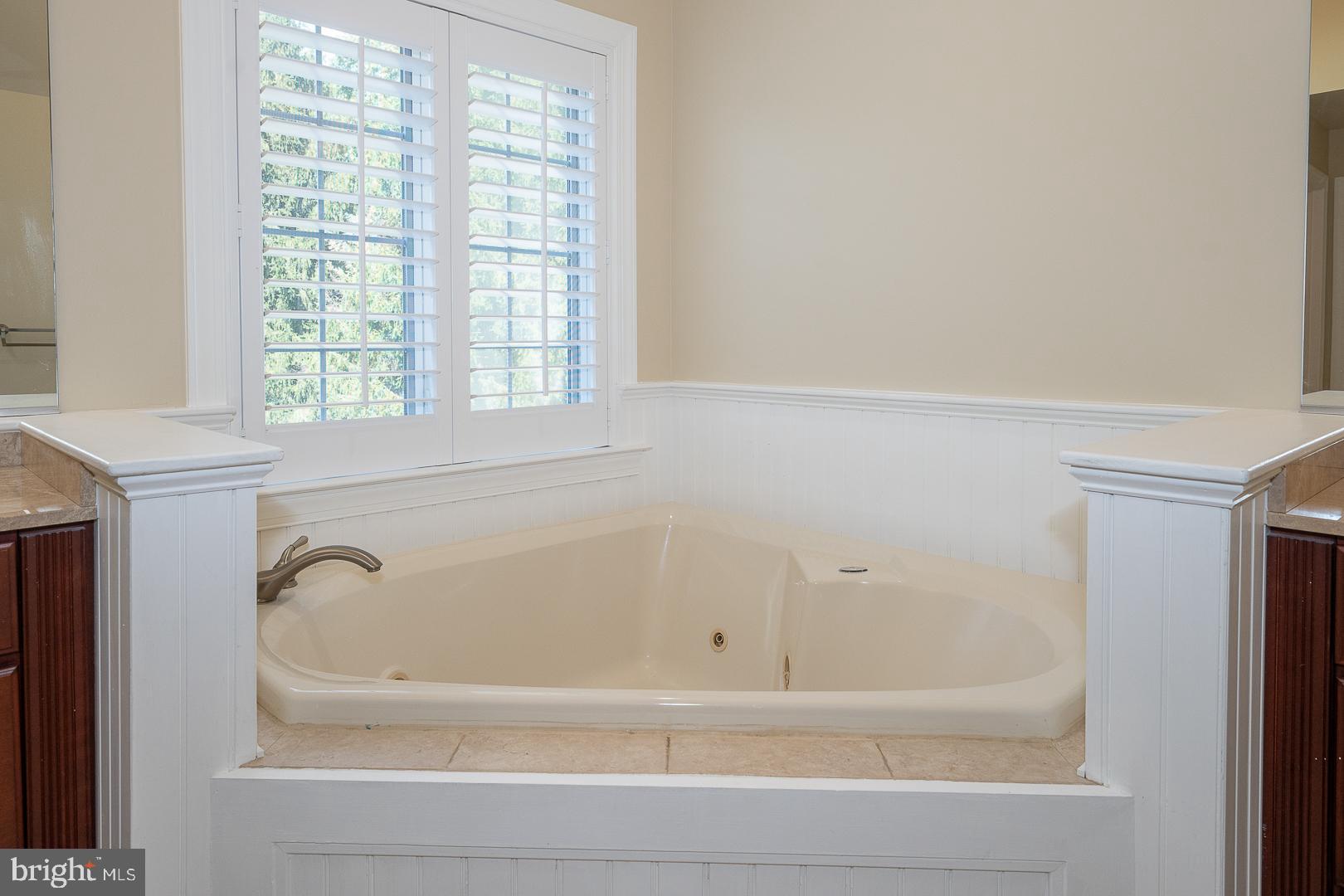 2140 Howell Road Malvern, PA 19355 - Photo 34 of 47 a bathroom with bathtub and window