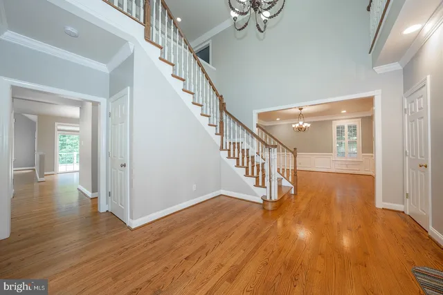 a view of entryway with wooden floor