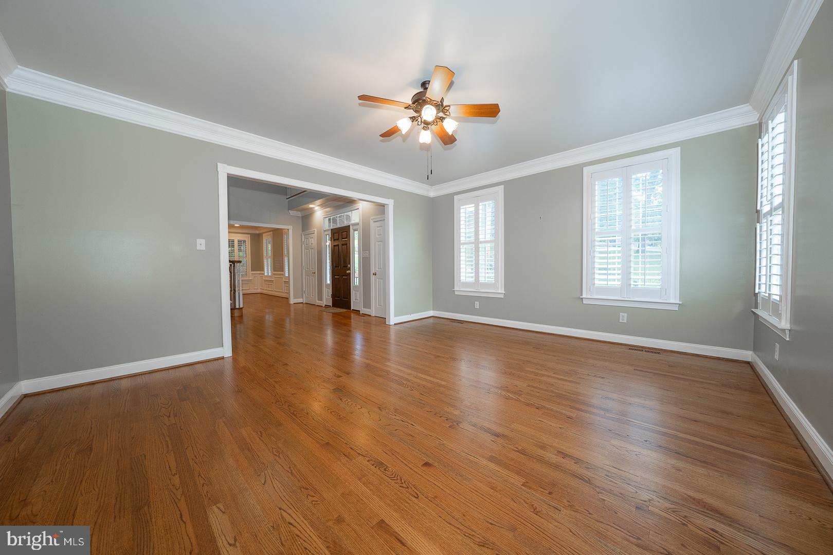 2140 Howell Road Malvern, PA 19355 - Photo 6 of 47 a view of an empty room with wooden floor and a window