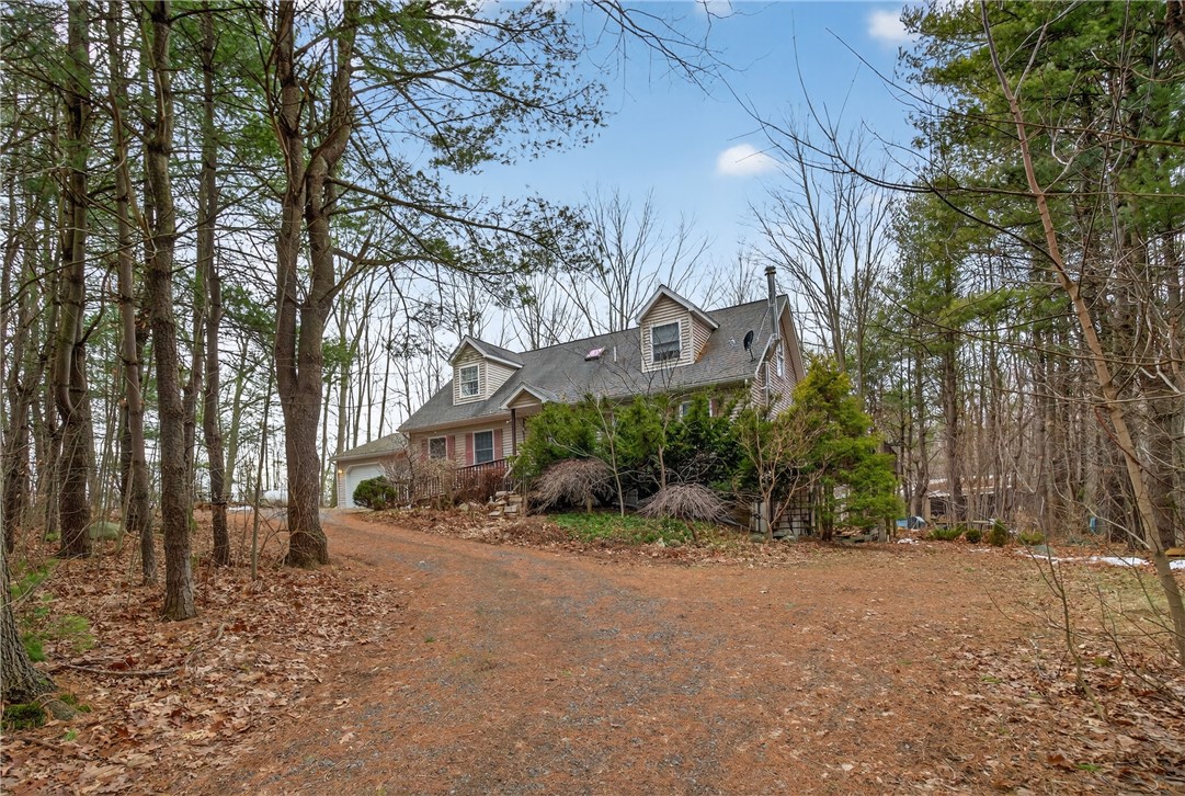 1936 Briggs Road Benton, NY 14527 - Photo 2 of 44 tucked back off the road