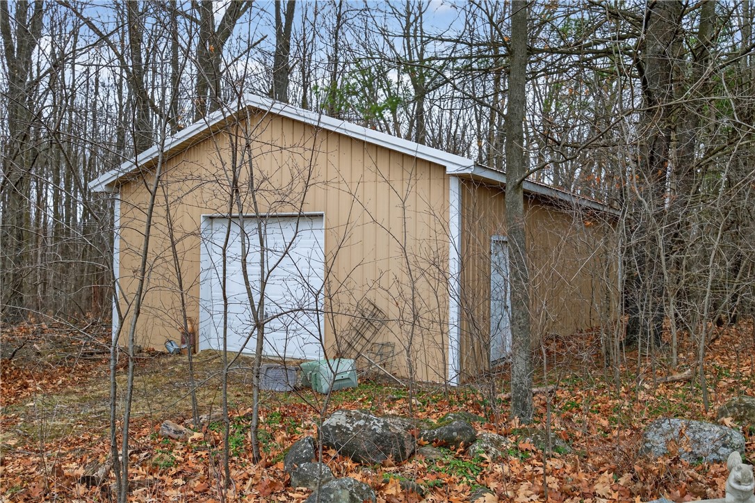 1936 Briggs Road Benton, NY 14527 - Photo 35 of 44 Metal barn approx. 24x40 with a concrete floor