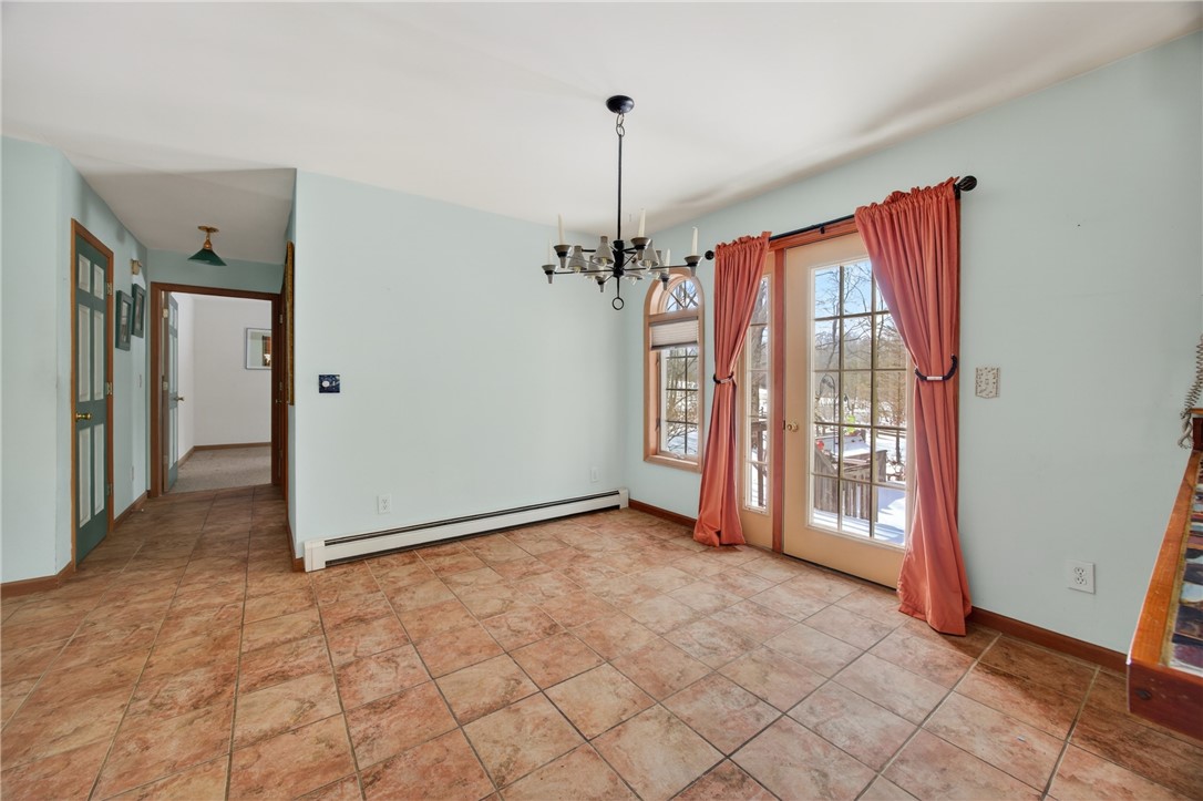 1936 Briggs Road Benton, NY 14527 - Photo 6 of 44 Dining room, door to back deck