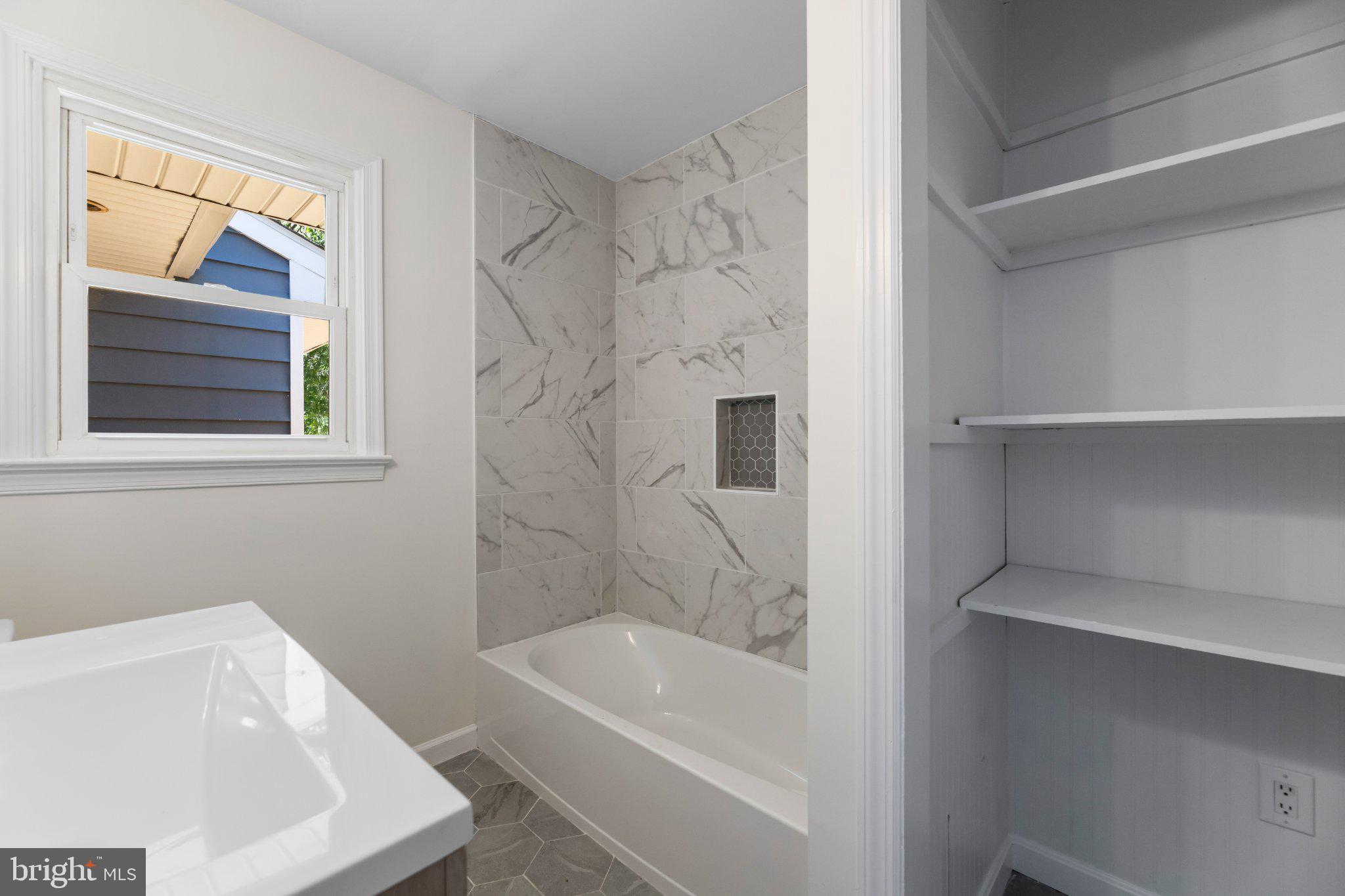 12 Oak Street Cambridge, MD 21613 - Photo 19 of 30 Modern bathroom with elegant finishes.