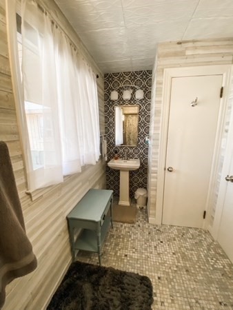 14 Crest Road Monson, MA 01057 - Photo 29 of 35 a bathroom with a sink a toilet and a window