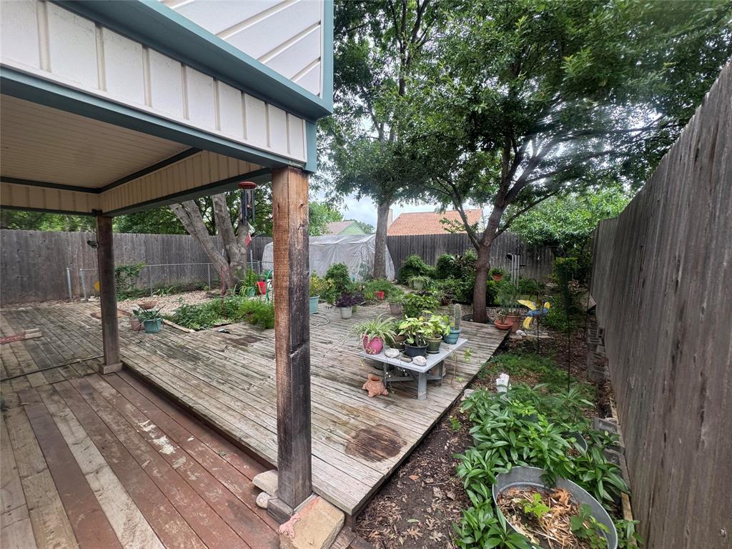 4649 Misty Ridge Drive Fort Worth, TX 76137 - Photo 10 of 25 a view of a backyard with sitting area