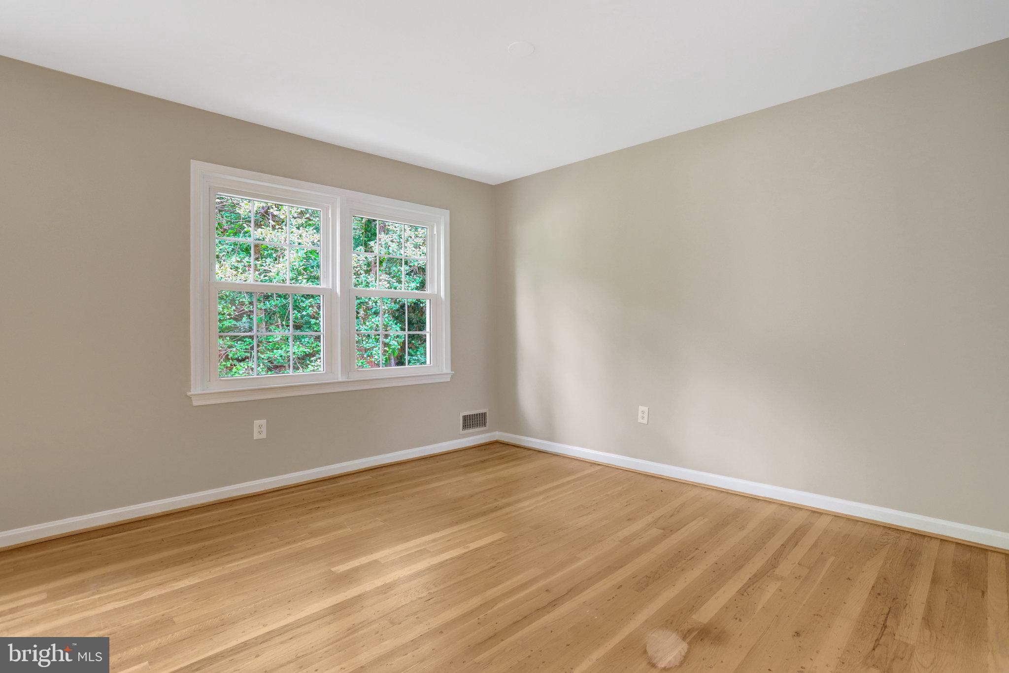 8706 Fox Ridge Road Springfield, VA 22152 - Photo 16 of 76 a view of an empty room with a window