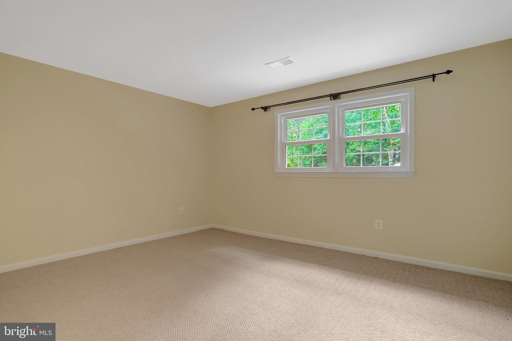 8706 Fox Ridge Road Springfield, VA 22152 - Photo 49 of 76 an empty room with a window