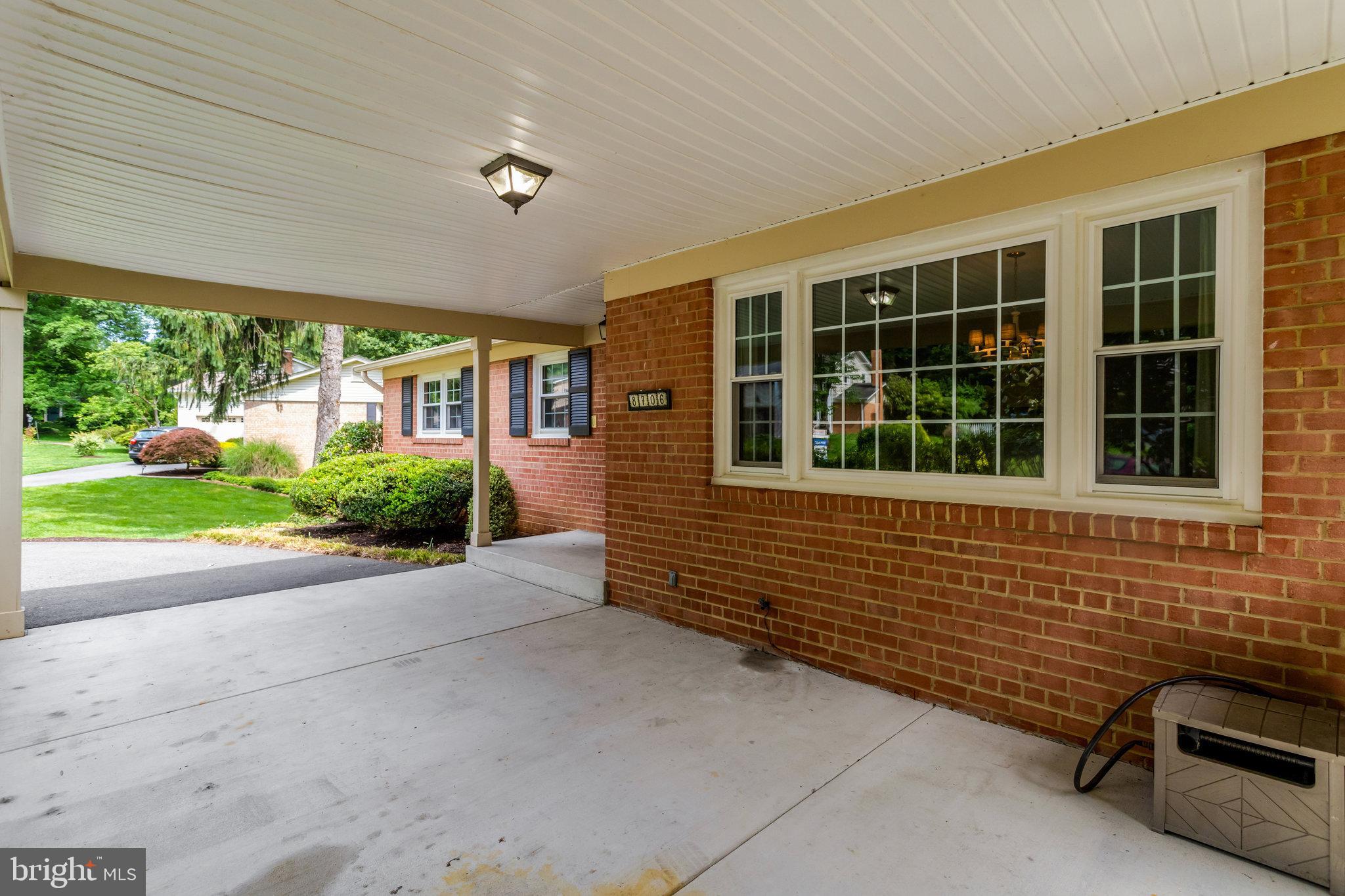 8706 Fox Ridge Road Springfield, VA 22152 - Photo 75 of 76 a view of a house with a yard