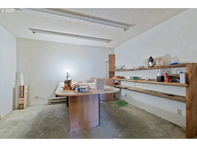 a living room with furniture a rug and a window