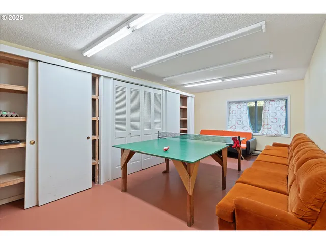 a kitchen with a cabinets and window
