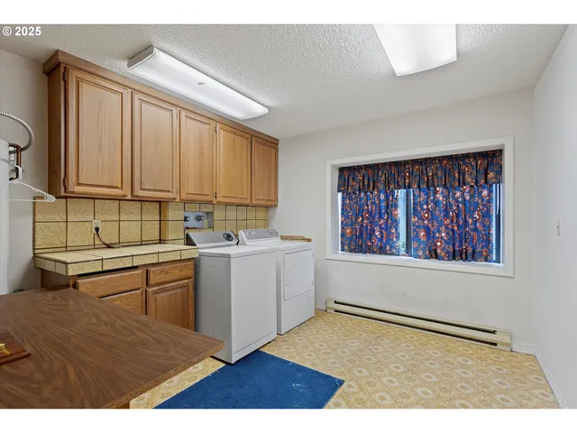 a picture of a room with floor to ceiling window