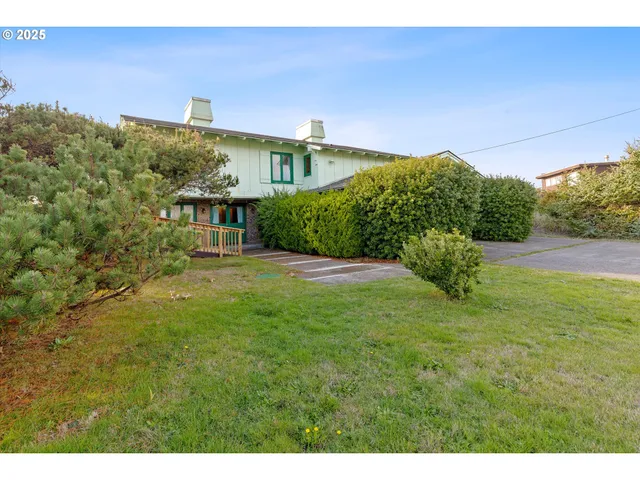 a view of a yard with an outdoor space