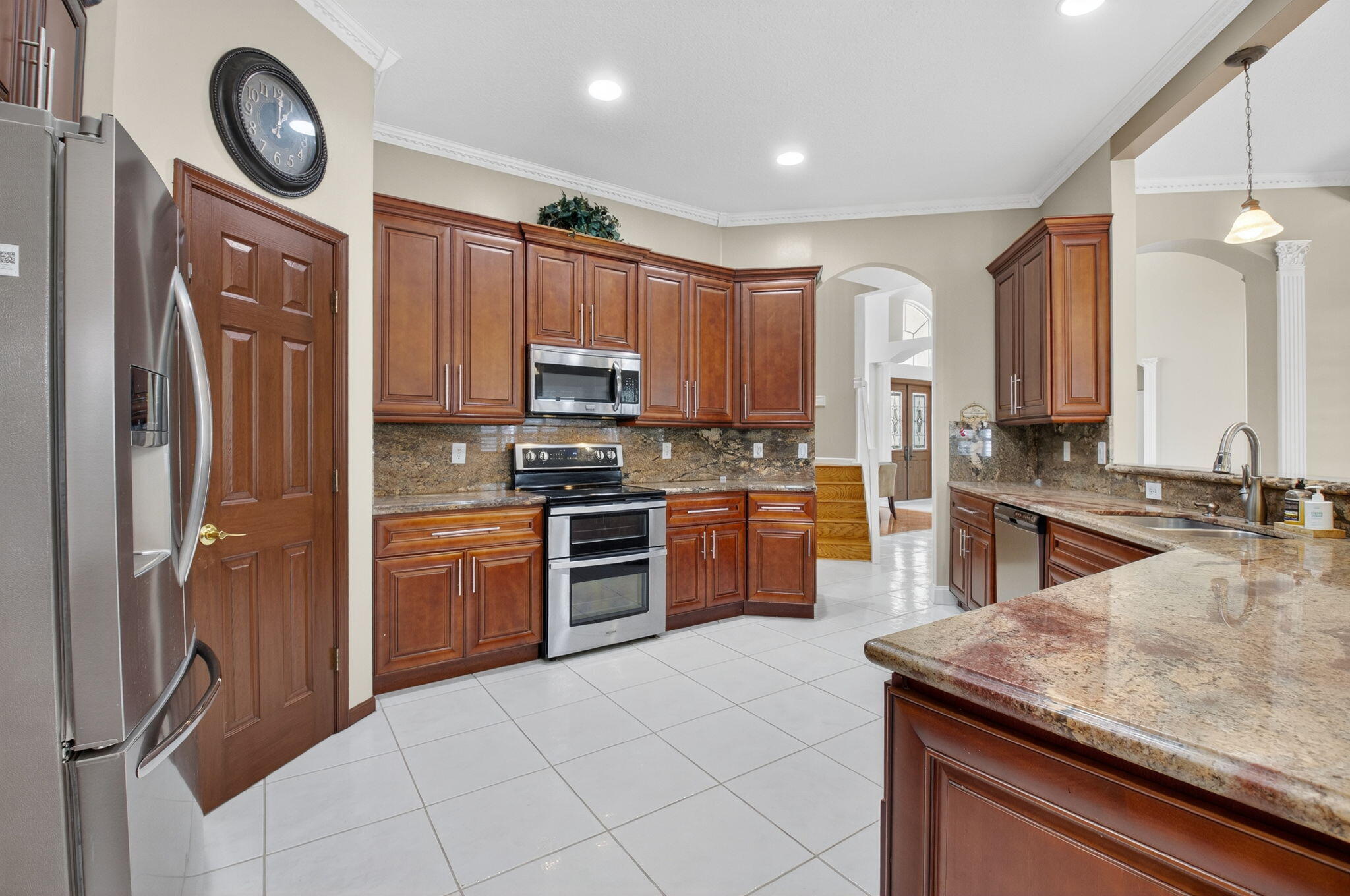 6695 Conch Court Boynton Beach, FL 33437 - Photo 12 of 40 Wood Cabinetry