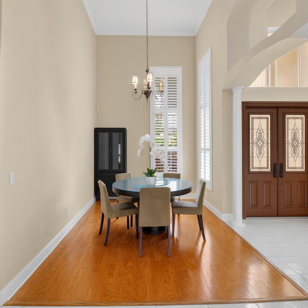 6695 Conch Court Boynton Beach, FL 33437 - Photo 7 of 40 Dining Room with and Orchid