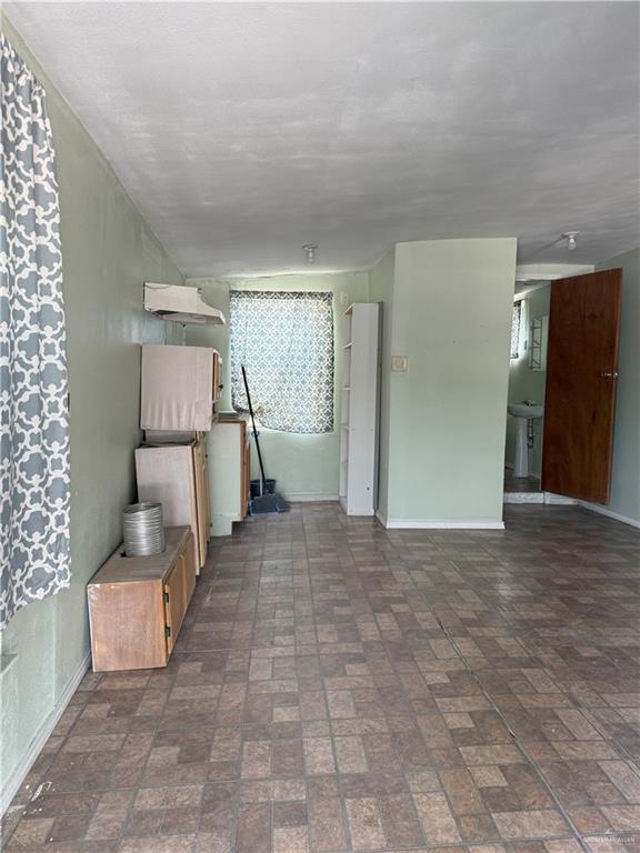 353 East Dicker Road Pharr, TX 78577 - Photo 12 of 32 a view of a livingroom with furniture and an empty room