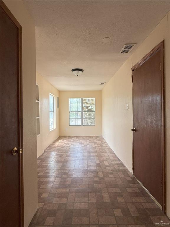 353 East Dicker Road Pharr, TX 78577 - Photo 13 of 32 a view of an empty room and window