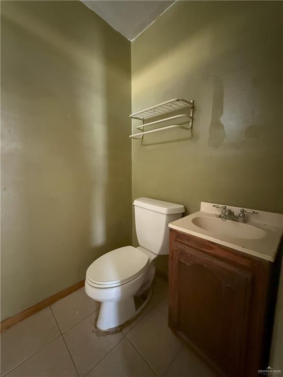 353 East Dicker Road Pharr, TX 78577 - Photo 25 of 32 a white toilet sitting next to a shower