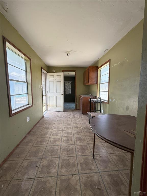 353 East Dicker Road Pharr, TX 78577 - Photo 27 of 32 a living room with couches and large window with rug