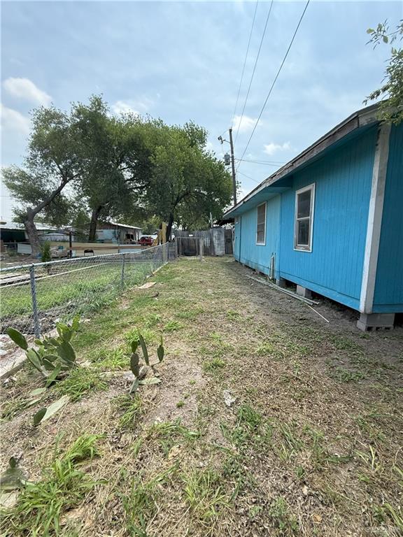 353 East Dicker Road Pharr, TX 78577 - Photo 29 of 32 a backyard of a house with table and chairs