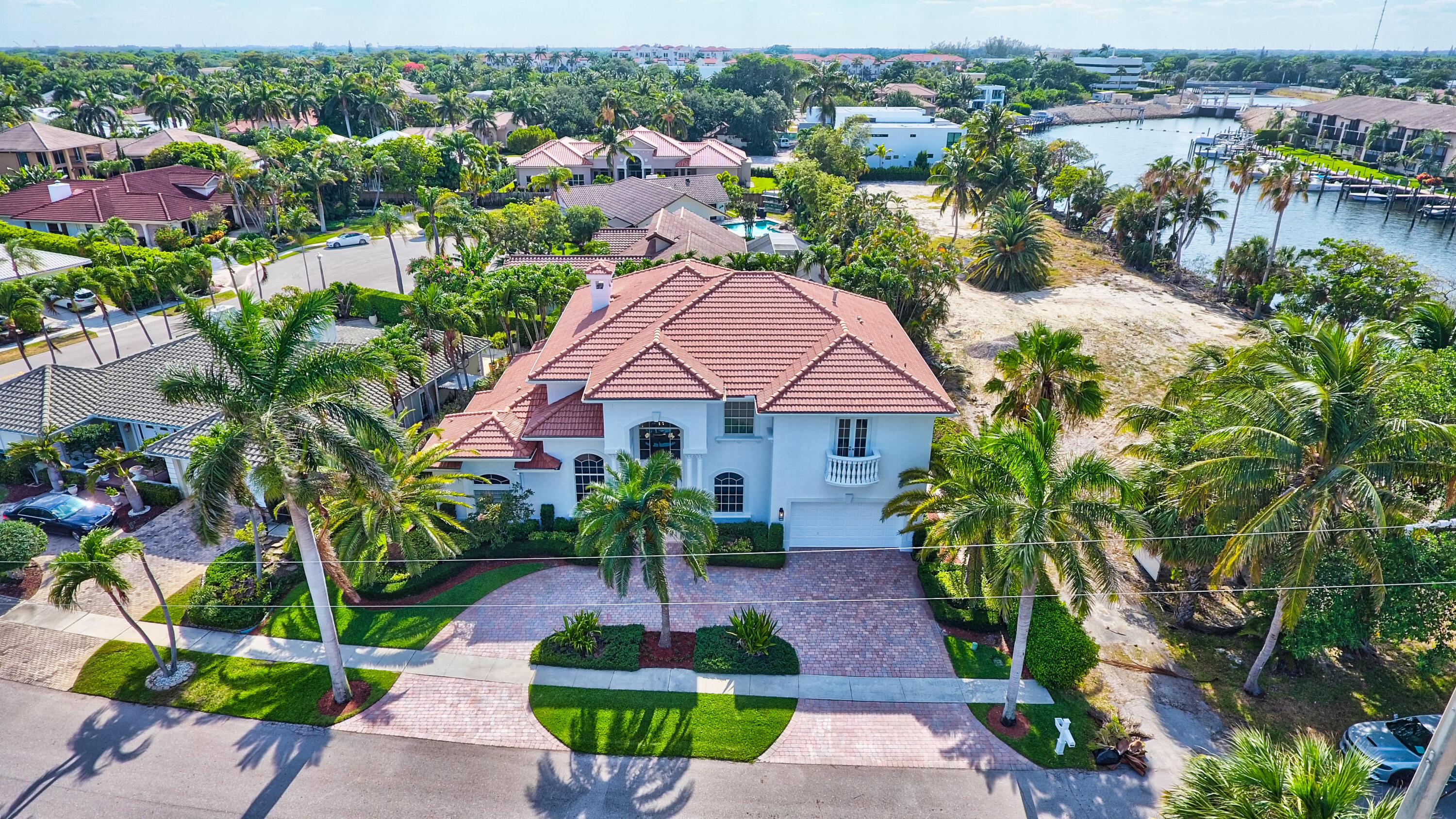 7899 Northeast Spanish Trail Court Boca Raton, FL 33487 - Photo 3 of 34 04_dji_0346_47_48_49_50