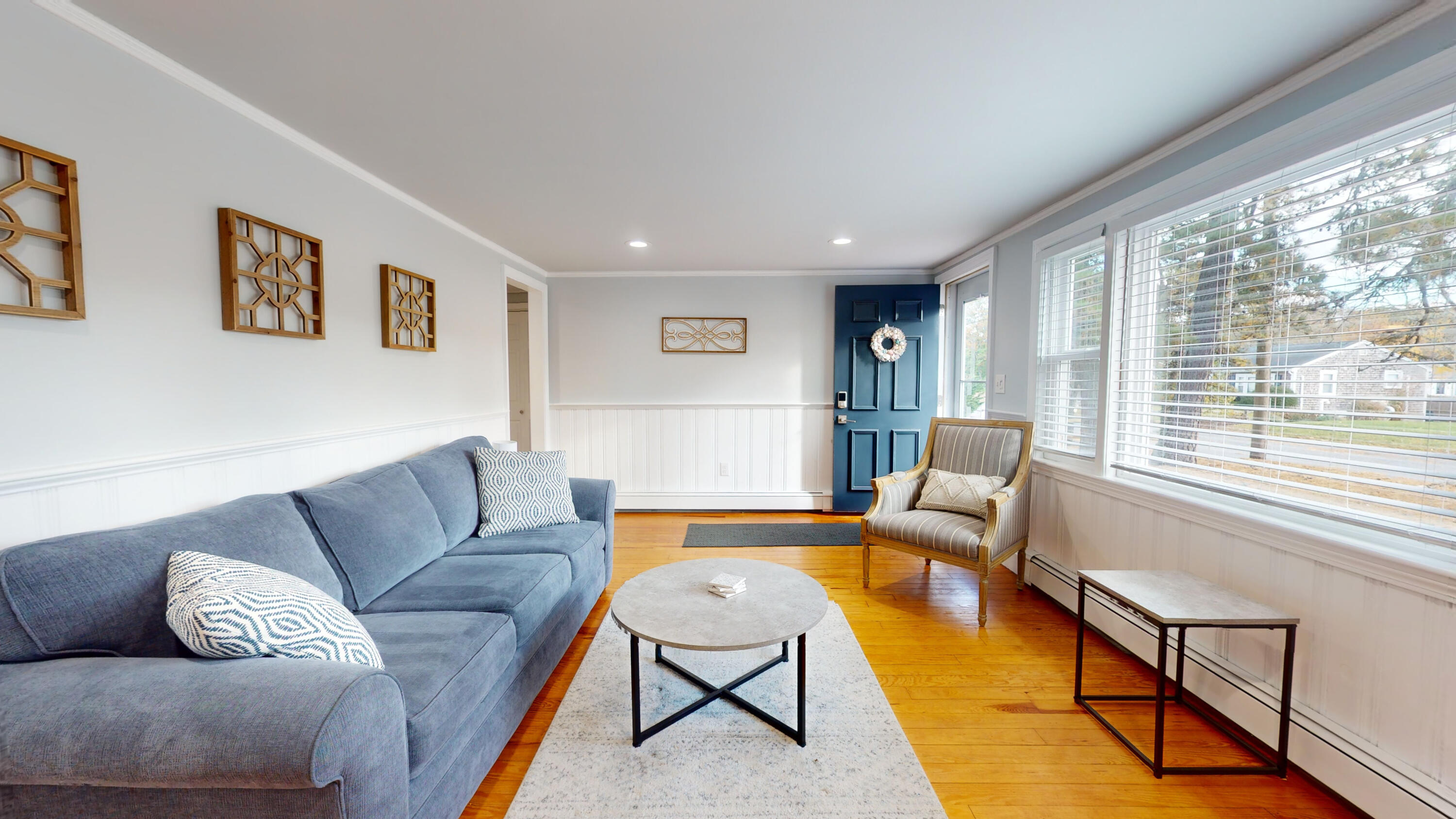 27 Wixon Road Dennis Port, MA 02639 - Photo 14 of 29 a living room with furniture and a large window
