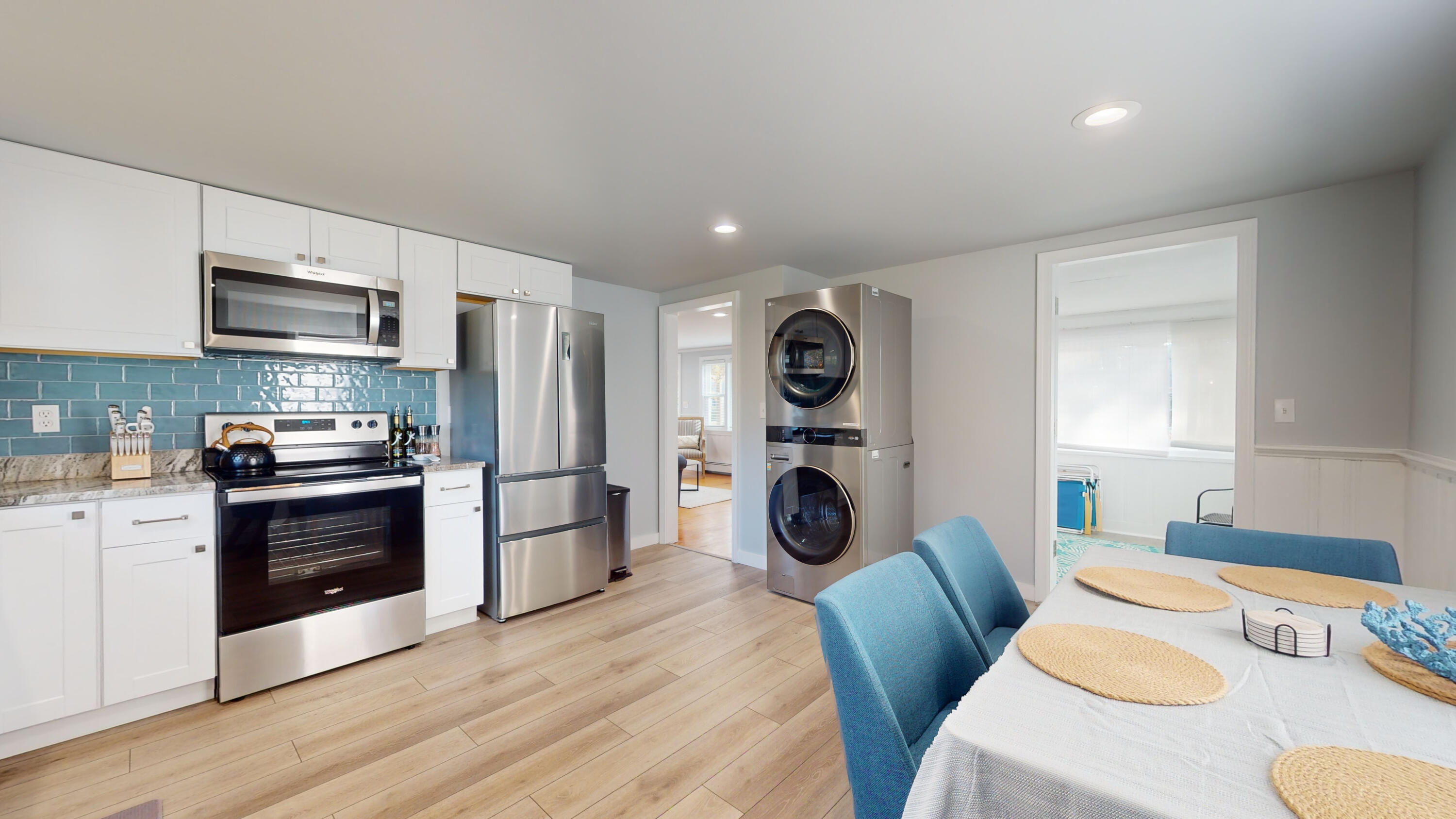 27 Wixon Road Dennis Port, MA 02639 - Photo 23 of 29 a kitchen with stainless steel appliances granite countertop a refrigerator a stove top oven a sink and dishwasher