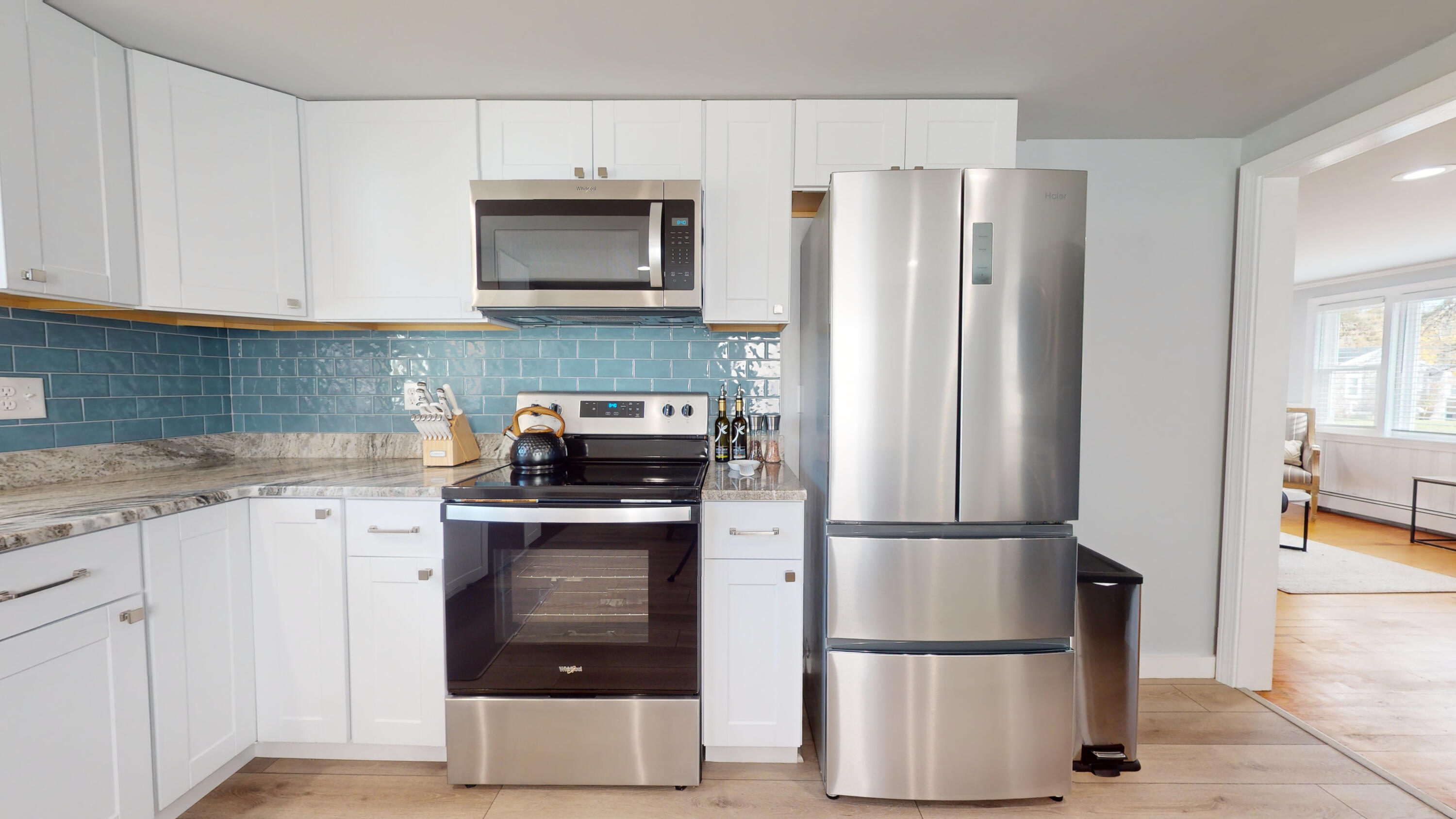 27 Wixon Road Dennis Port, MA 02639 - Photo 26 of 29 a kitchen with stainless steel appliances granite countertop a refrigerator stove and microwave