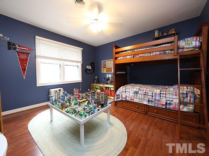 Wood looking laminate flooring and a nice walk in closet in this secondary bedroom!