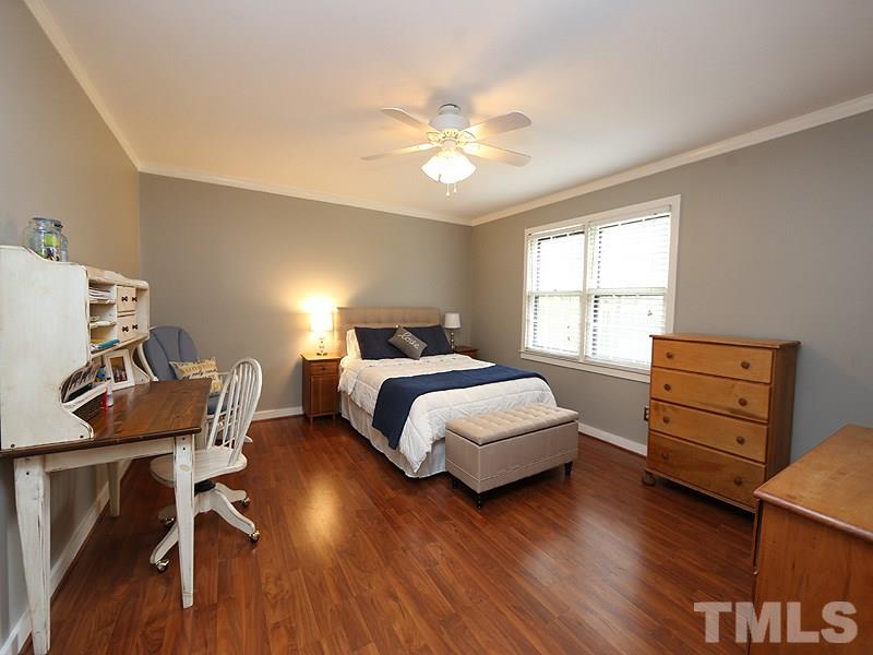 1608 Barley Place Raleigh, NC 27615 - Photo 8 of 17 Master is on the main level and has a walk in closet, laminate easy care wood looking floors and direct access to the main level bathroom.