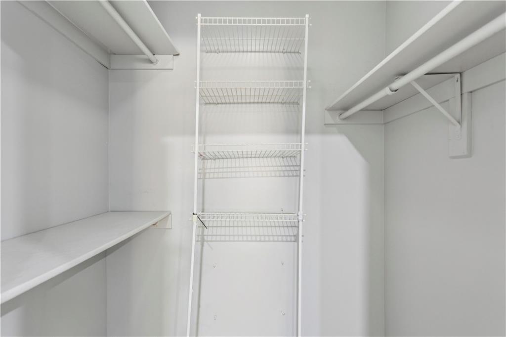 1308 Natchez Trace Atlanta, GA 30350 - Photo 18 of 27 a view of an empty walk in closet