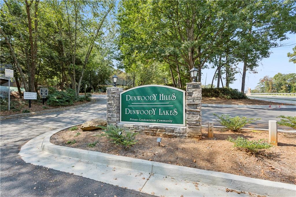 1308 Natchez Trace Atlanta, GA 30350 - Photo 26 of 27 a sign board with a park