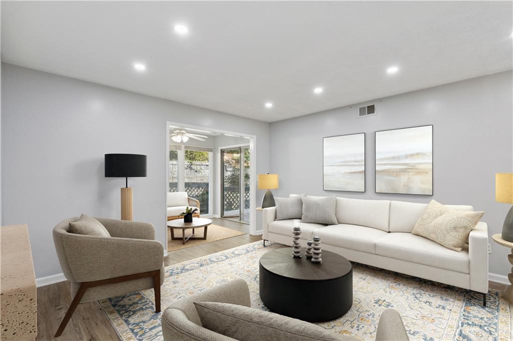 1308 Natchez Trace Atlanta, GA 30350 - Photo 4 of 27 a living room with furniture and a large window
