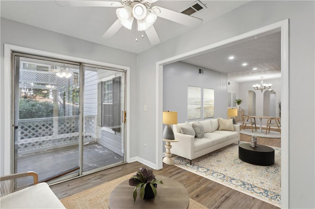 1308 Natchez Trace Atlanta, GA 30350 - Photo 7 of 27 a living room with furniture and a glass door