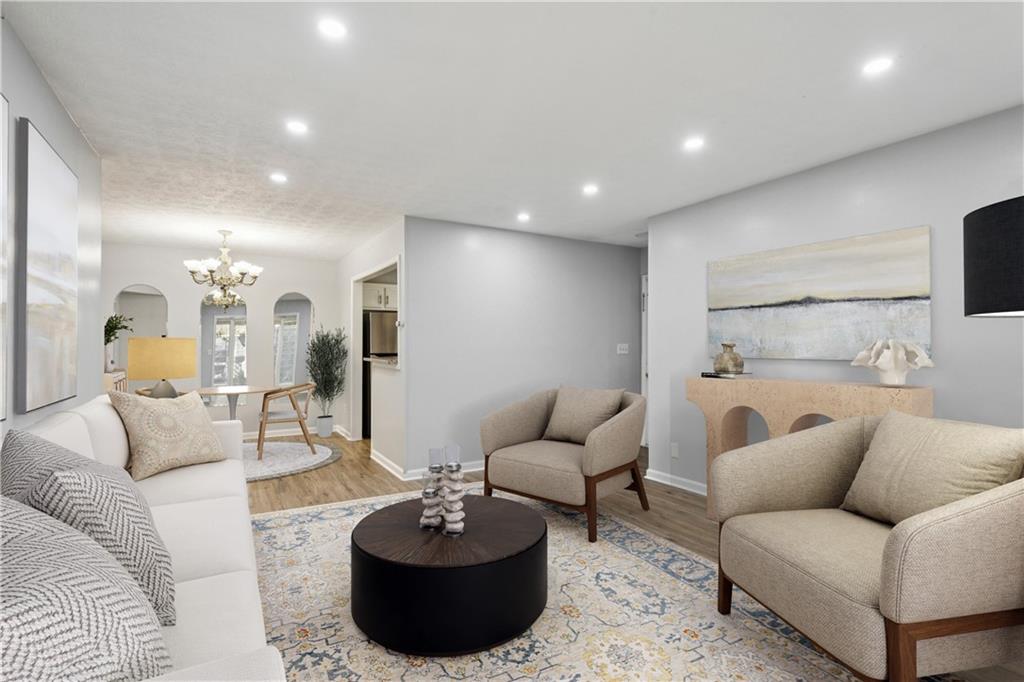 1308 Natchez Trace Atlanta, GA 30350 - Photo 8 of 27 a living room with furniture and a couch