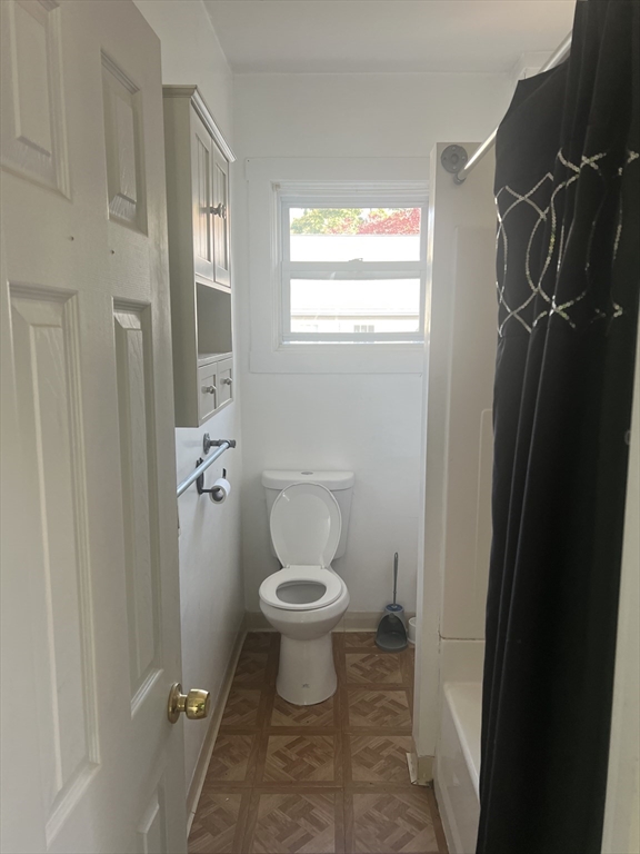 1241 North High Street, Unit 2 Fall River, MA 02720 - Photo 11 of 12 a bathroom with a toilet and a shower