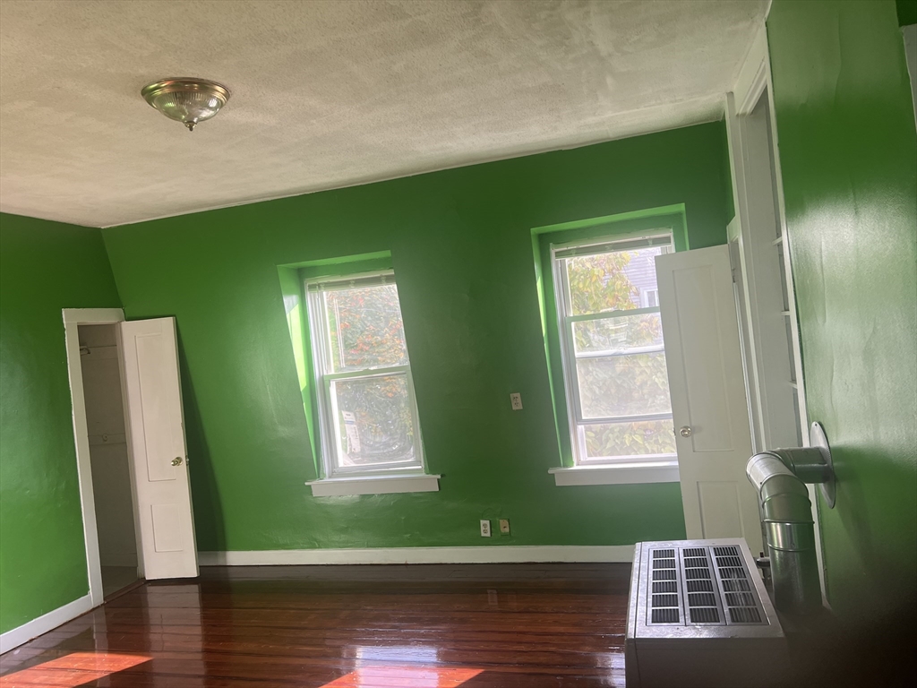 1241 North High Street, Unit 2 Fall River, MA 02720 - Photo 4 of 12 a view of front door with yard