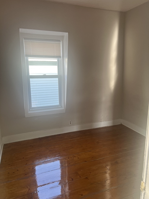 1241 North High Street, Unit 2 Fall River, MA 02720 - Photo 7 of 12 an empty room with a window