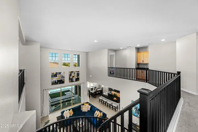 a spacious bedroom with a bed and cabinet