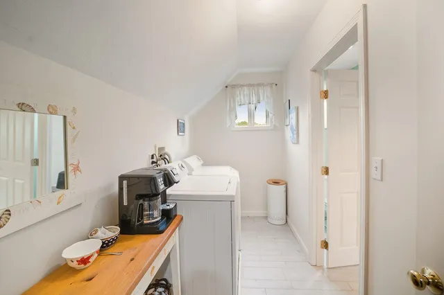 a bathroom with a sink toilet and tub