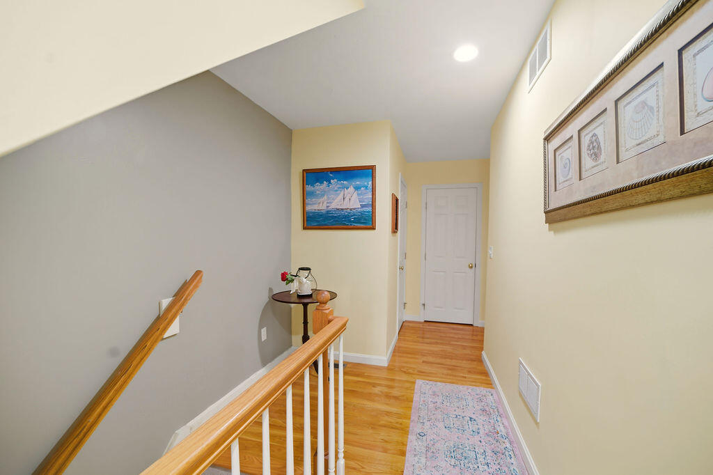 69 Bay Pointe Dr Extension, Unit 69 Buzzards Bay, MA 02532 - Photo 30 of 44 a view of a hallway with closet