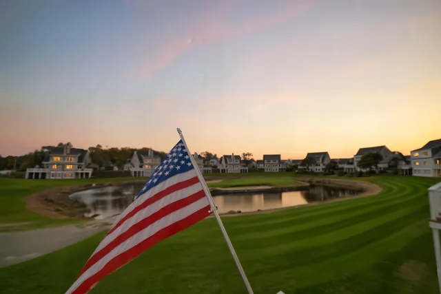 a view of a lake with a big yard