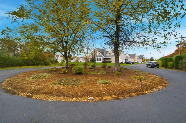 a view of a playground with basketball court