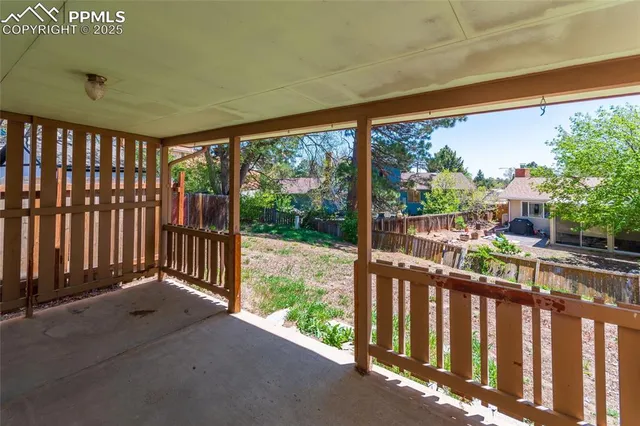 a view of a backyard of the house