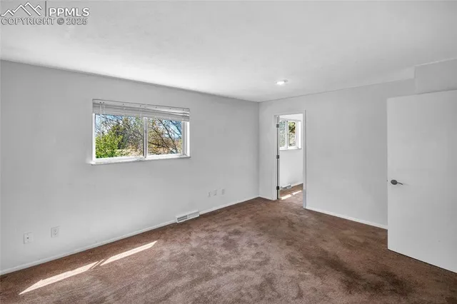 a bathroom with a granite countertop sink a toilet and bathtub