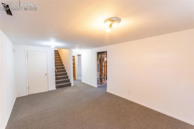 a view of a bathroom with a glass door